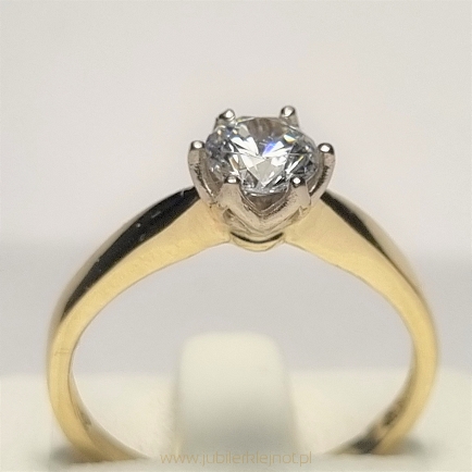 Pierścionek złoty z brylantem 0,65CT